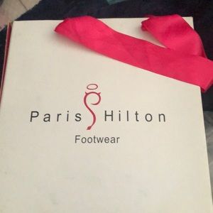 Paris Hilton black heels 👠